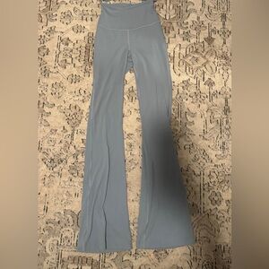 Light blue Lululemon flared leggings has matching sports bra on page